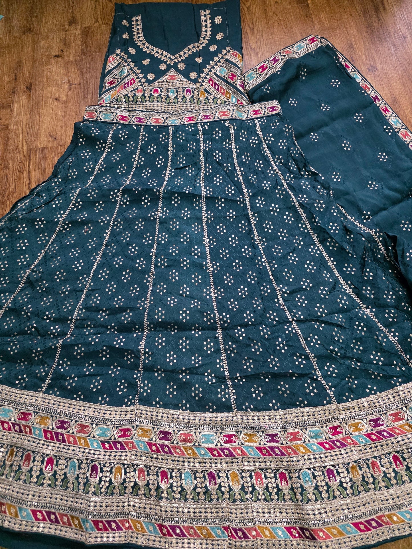 BOTTLE GREEN SEMI STITCHED LEHENGA