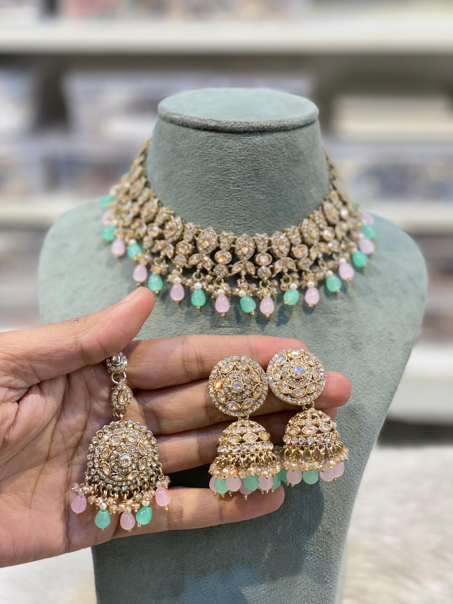 Pink & Green
Kundan Choker Necklace Set with Pink & Green Beads and Matching Jhumka Earrings – Indian Bridal Jewellery | Kanishma Sarees (Kanishma Collection)