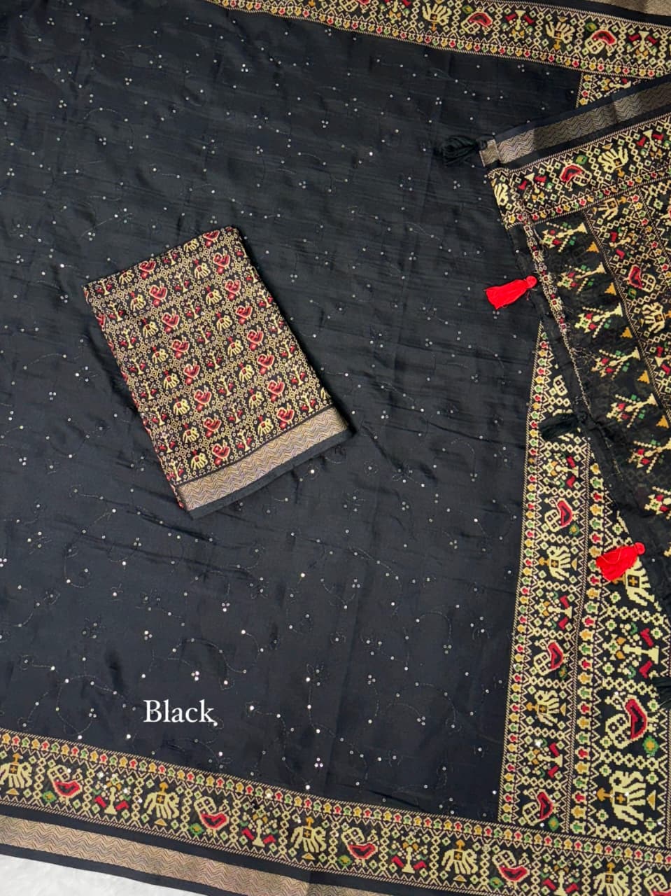 Black Saree Close up 
Black Pure Viscose Georgette Saree with Zari Work and Jacquard Border – Elegant Designer Partywear Saree