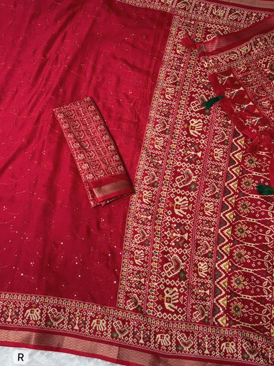 Red Saree Close up 
Red Pure Viscose Georgette Saree with Zari Work and Jacquard Border – Elegant Designer Partywear Saree